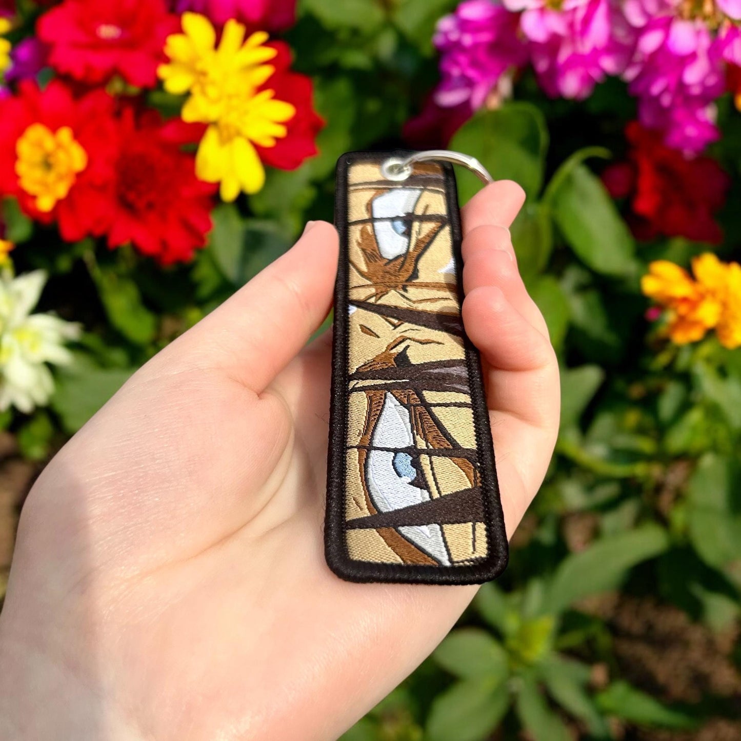 Sharp-Eyed Hero Embroidered Keychain