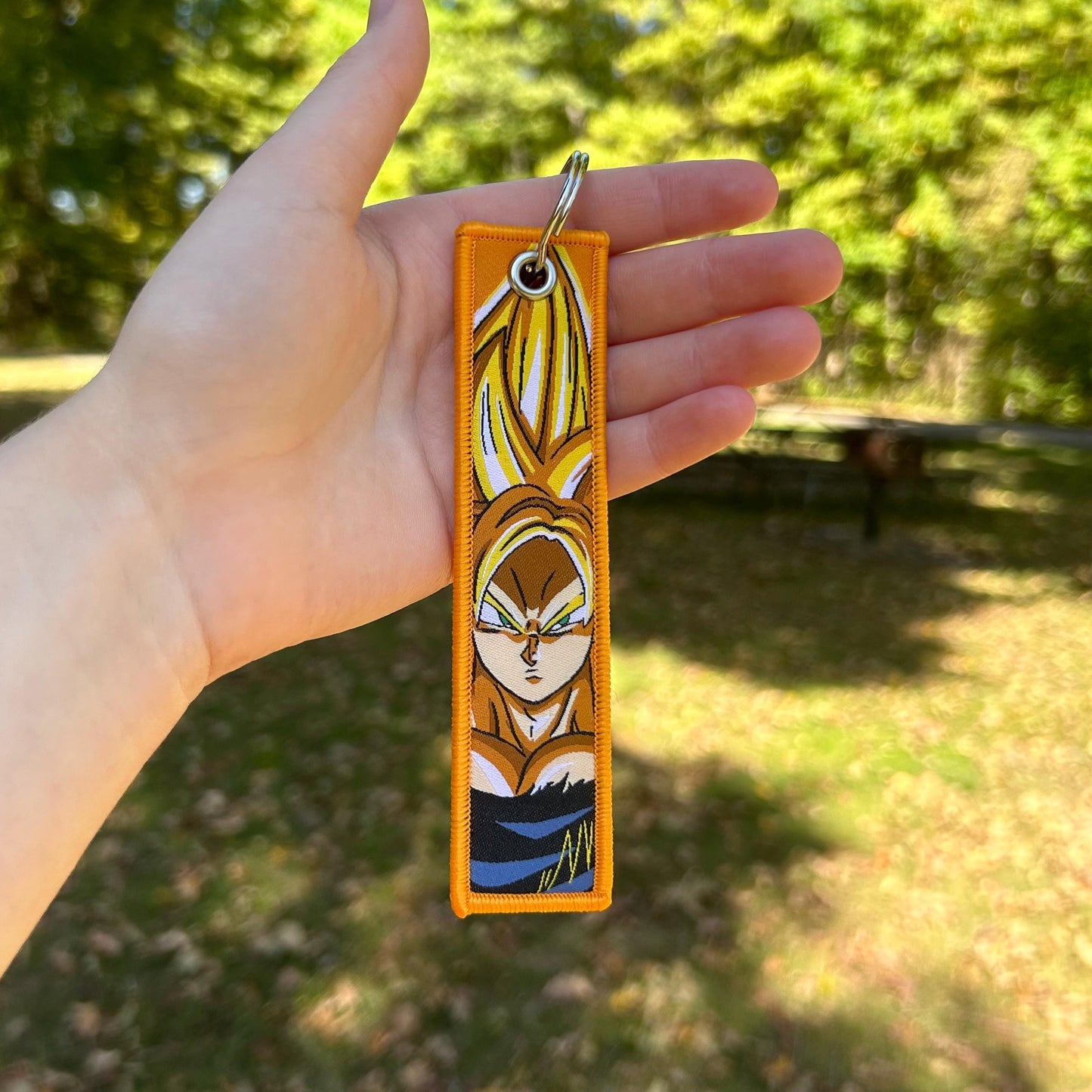Black & Gold Aura Fighter Embroidered Keychain