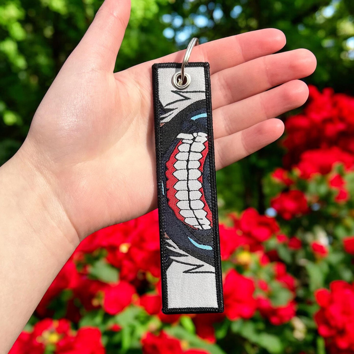 Crimson-Eyed Survivor Embroidered Keychain