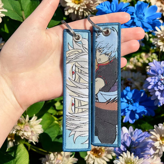 Comedic Swordsman Embroidered Keychain