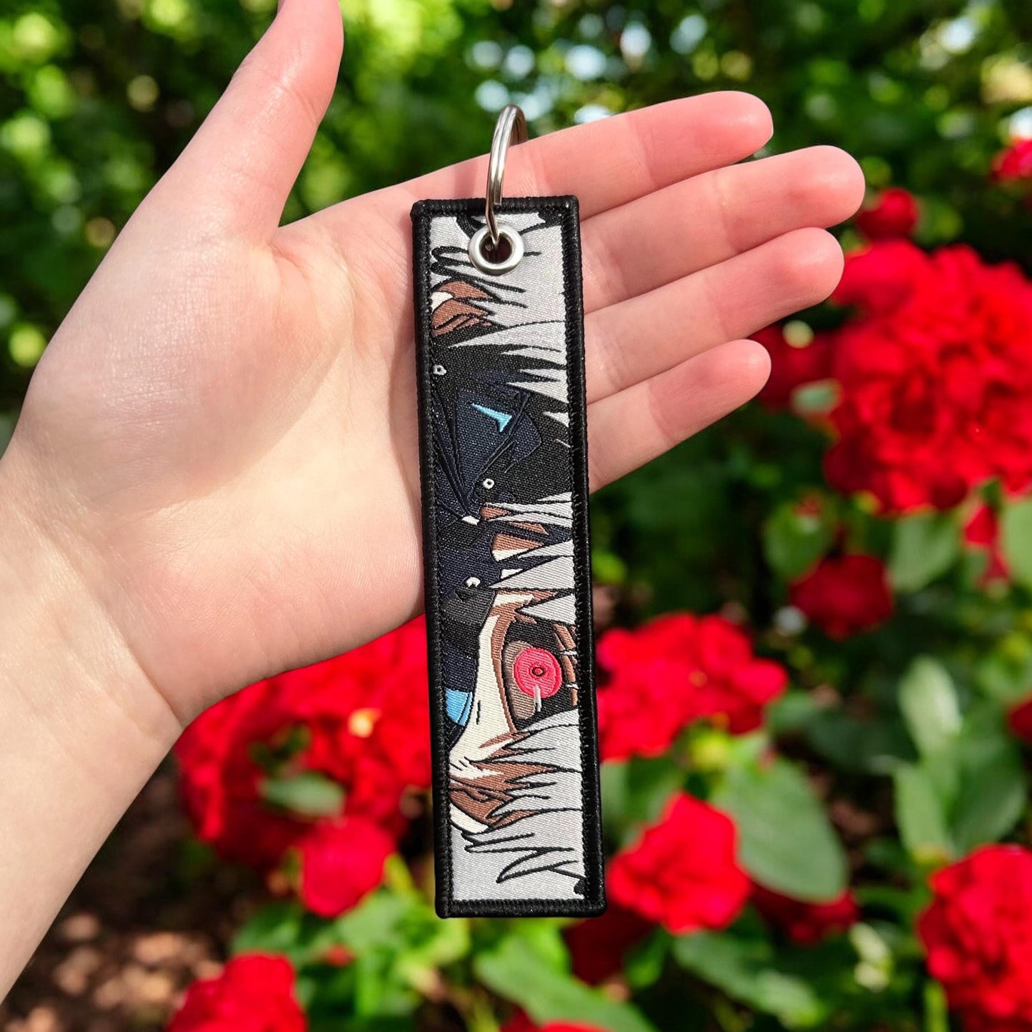 Crimson-Eyed Survivor Embroidered Keychain