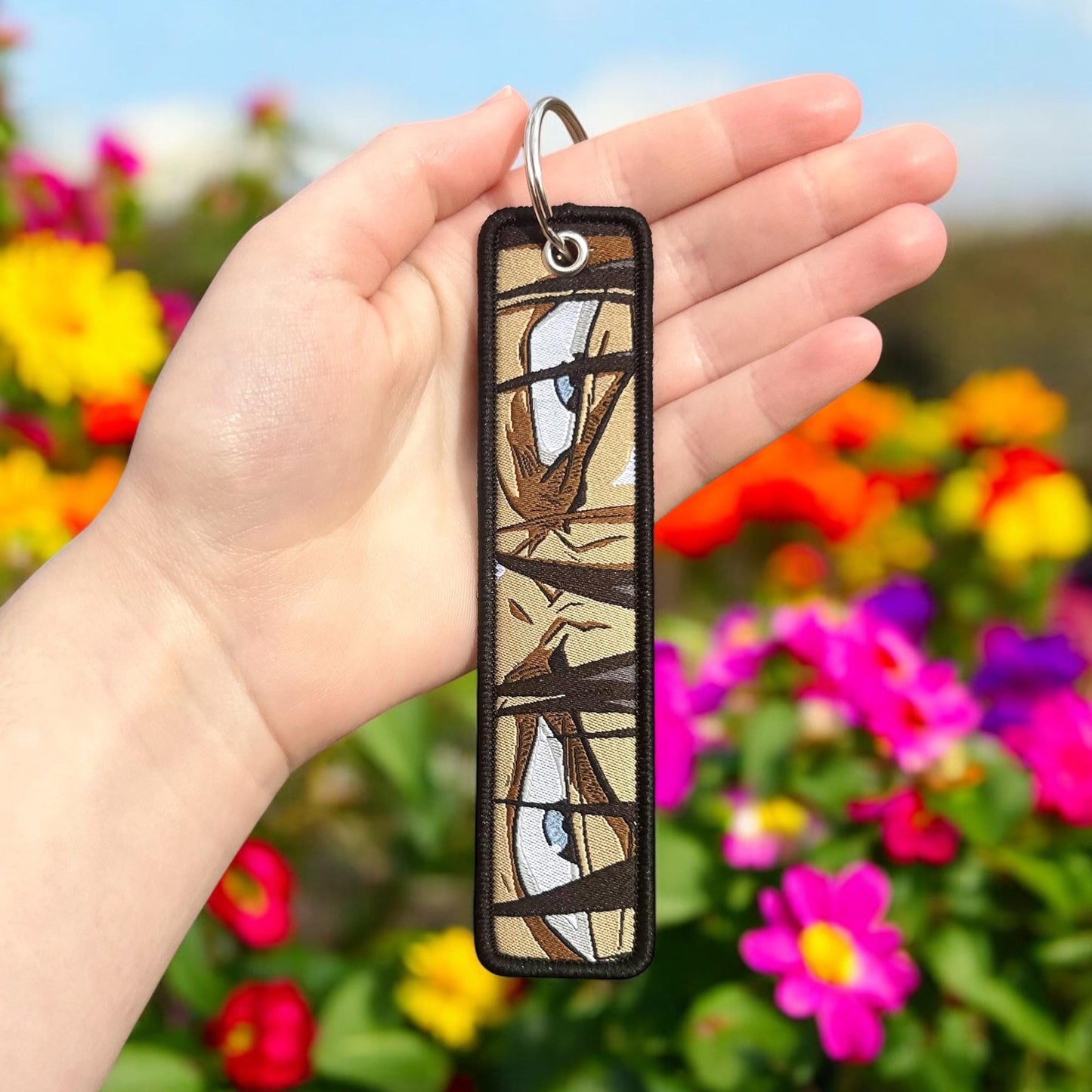 Sharp-Eyed Hero Embroidered Keychain