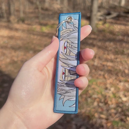 Comedic Swordsman Embroidered Keychain