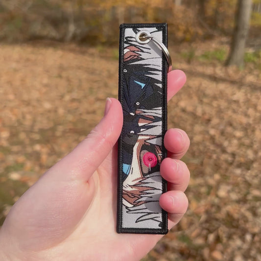 Crimson-Eyed Survivor Embroidered Keychain